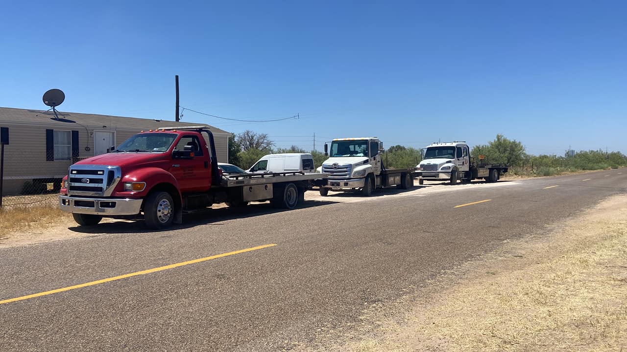 Man Working In Towing Service On The Road